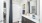 a bathroom with a sink toilet and mirror