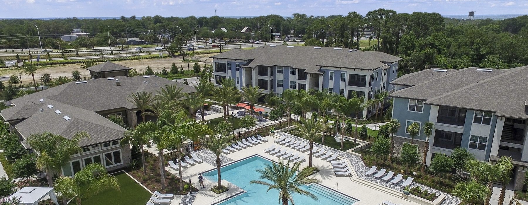a pool surrounded by buildings