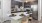a kitchen with a table and chairs