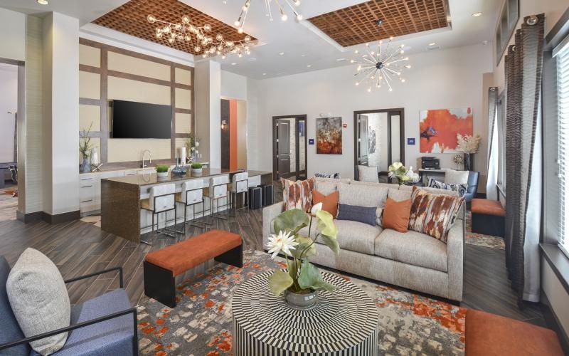 a living room with a couch and a table